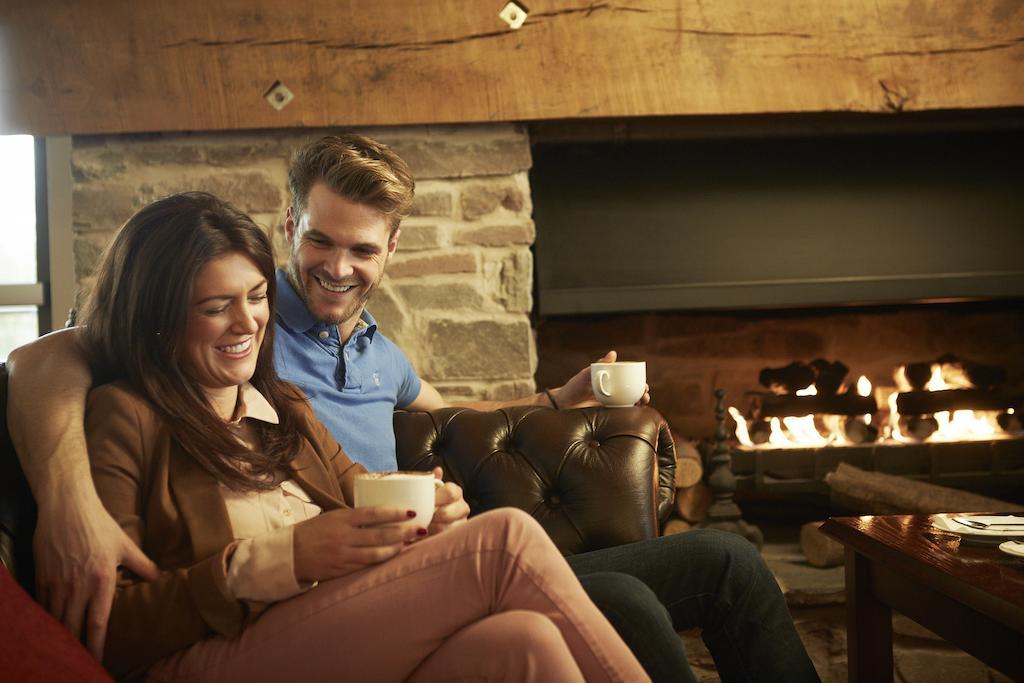 The Celtic Manor Resort Newport  Dış mekan fotoğraf A couple drinking coffee